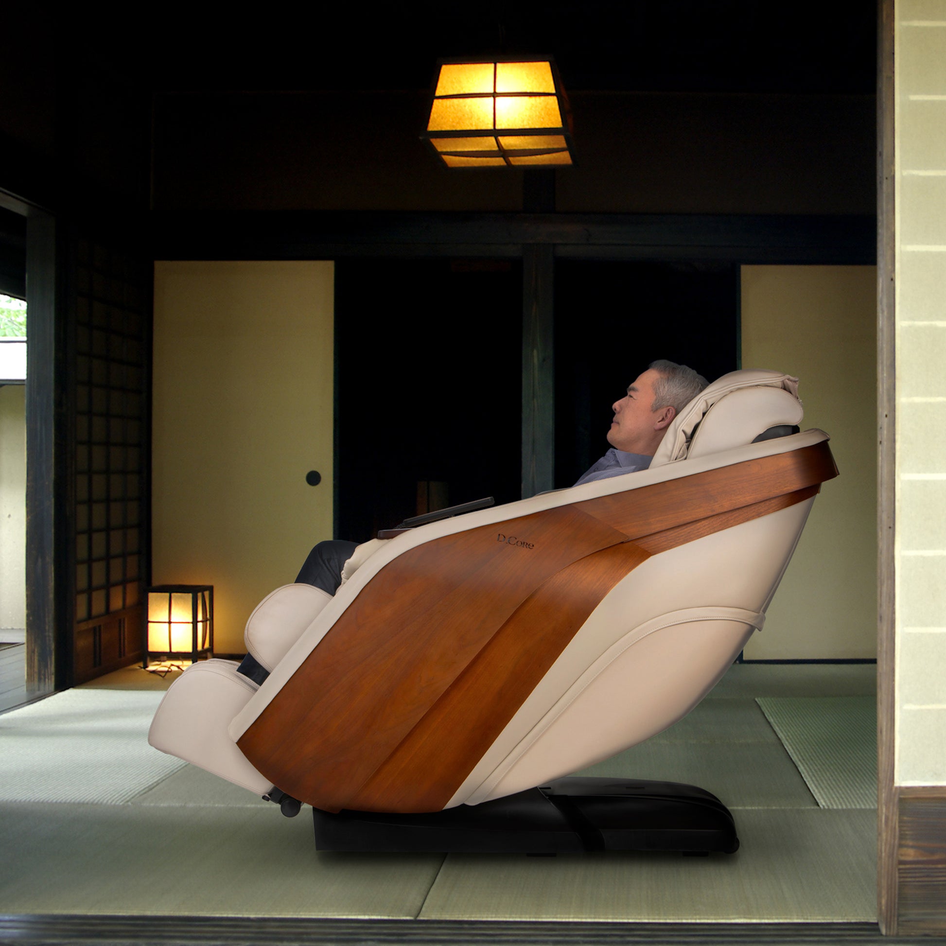 DCore STRATUS electric massaging chair with wood panel accents in a modern Japanese-style room