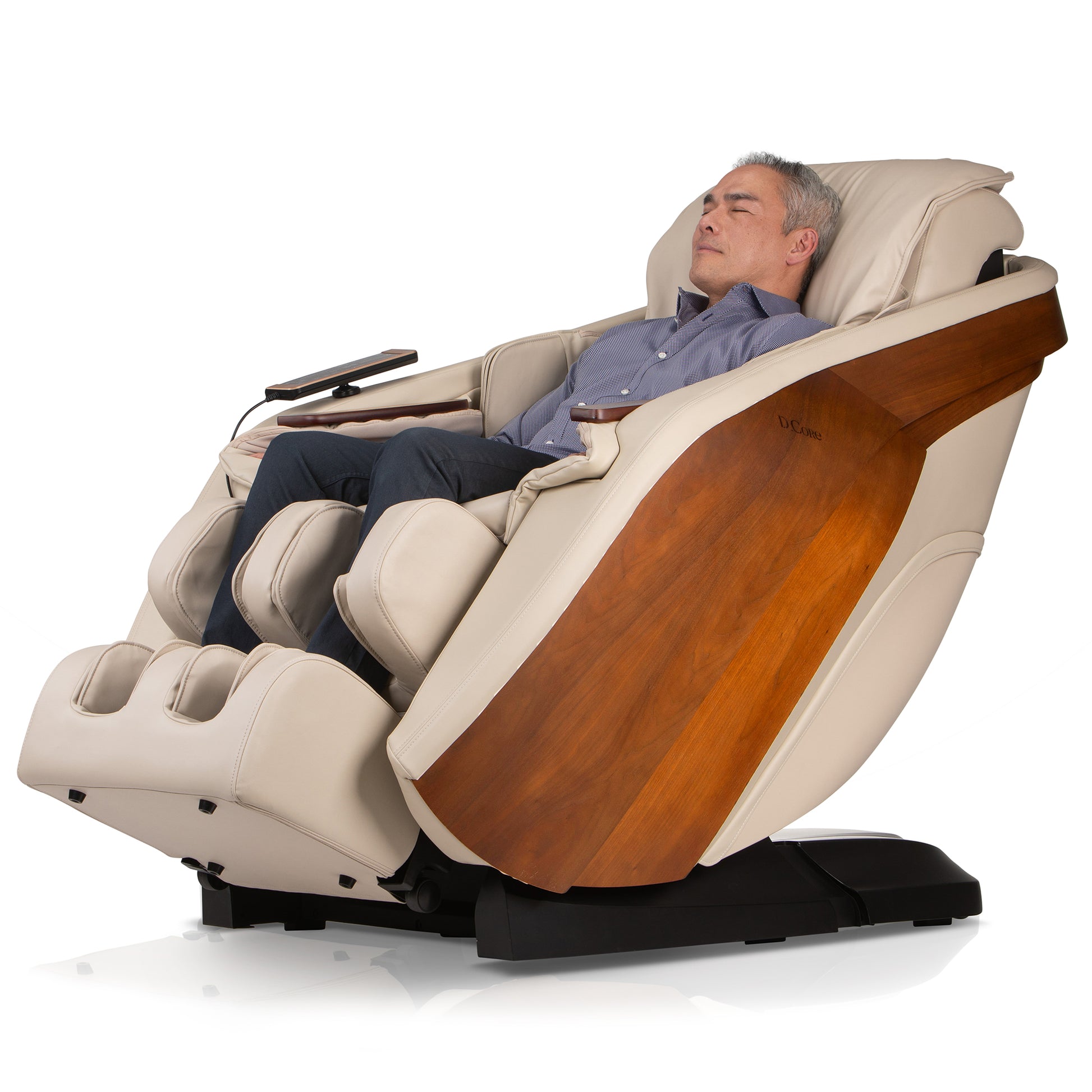 DCore STRATUS electric massaging chair in beige with wooden panel and man relaxing