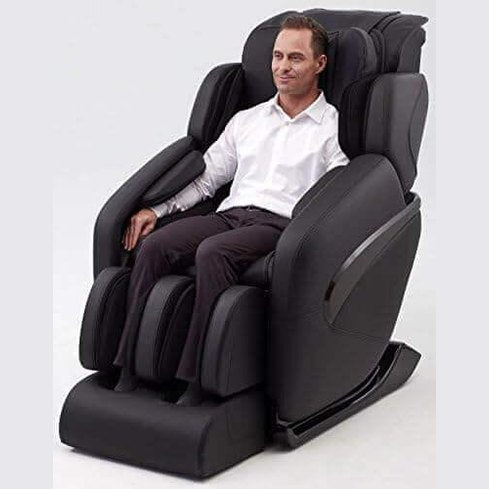 Inner Balance Jin Massage Chair in black with a man relaxing and enjoying electric massage features