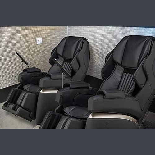 Synca Wellness Kurodo Massage Chair in black electric massaging chairs with footrests in a showroom
