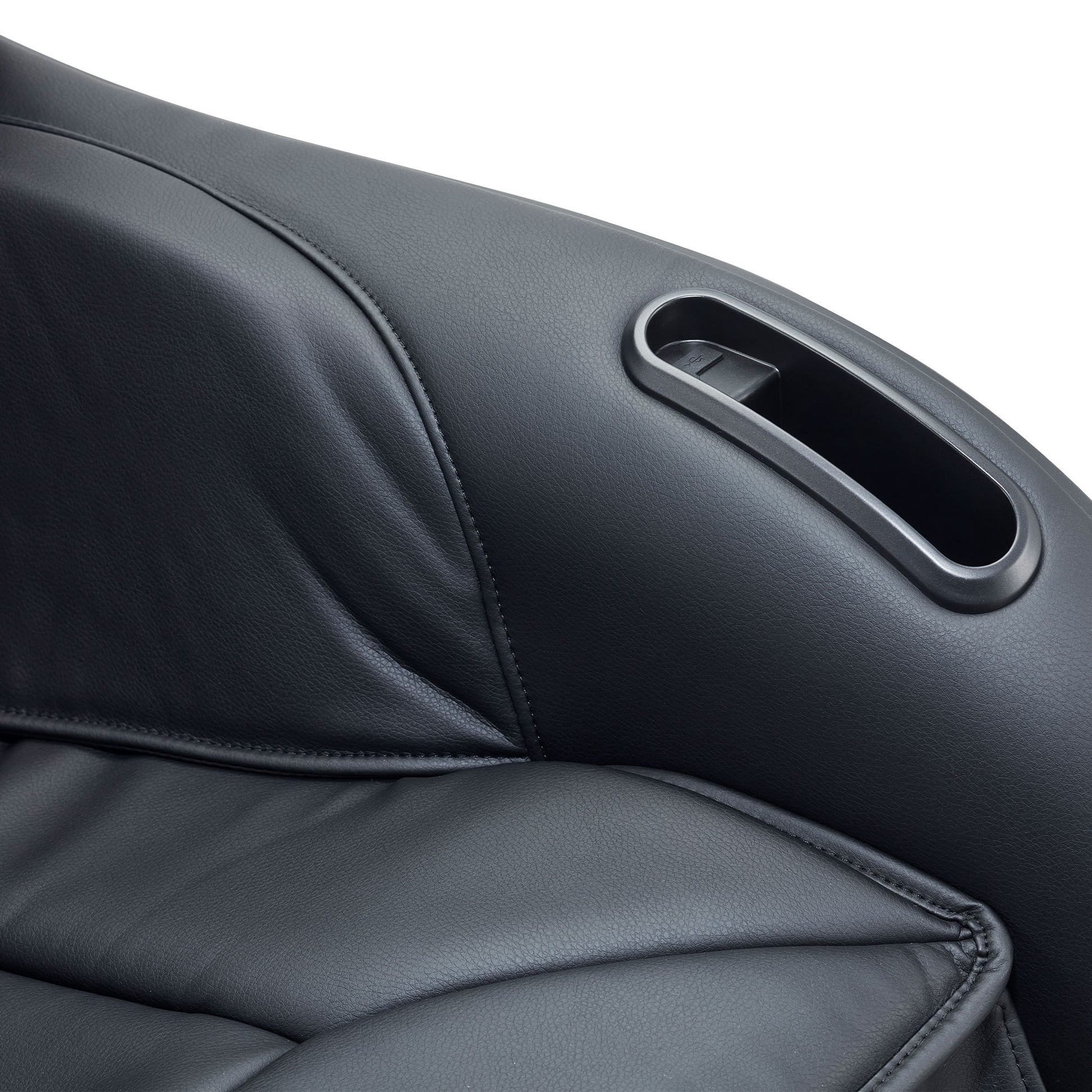 Close-up of black leather upholstery and cup holder on Synca Wellness CirC 3 Massage Chair