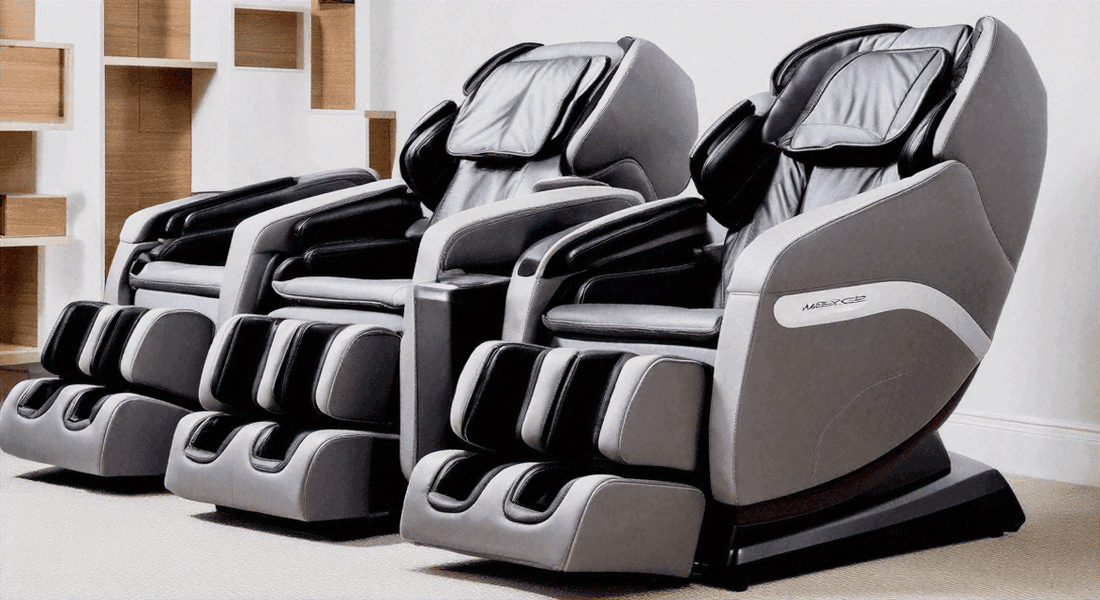 Massage chairs with Justifying the High Cost of Quality Massage Chairs in grey and black faux leather, with padded seats and footrests.