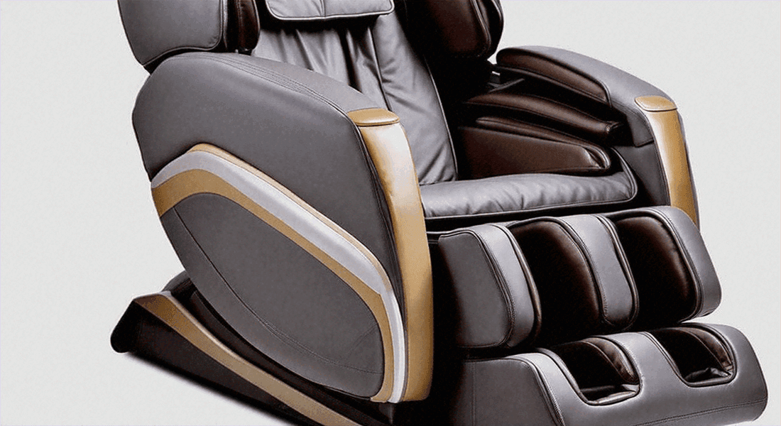 Massage chair, a Key Feature to Look for in a Luxury Massage Chair, with dark brown upholstery, gold trim, and cushioned leg supports
