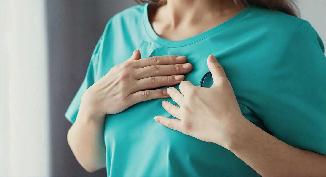 Woman in a turquoise T-shirt holds her chest, illustrating Massage Chair and Improve Cardiovascular Health: A Relaxing Path to Heart Wellness