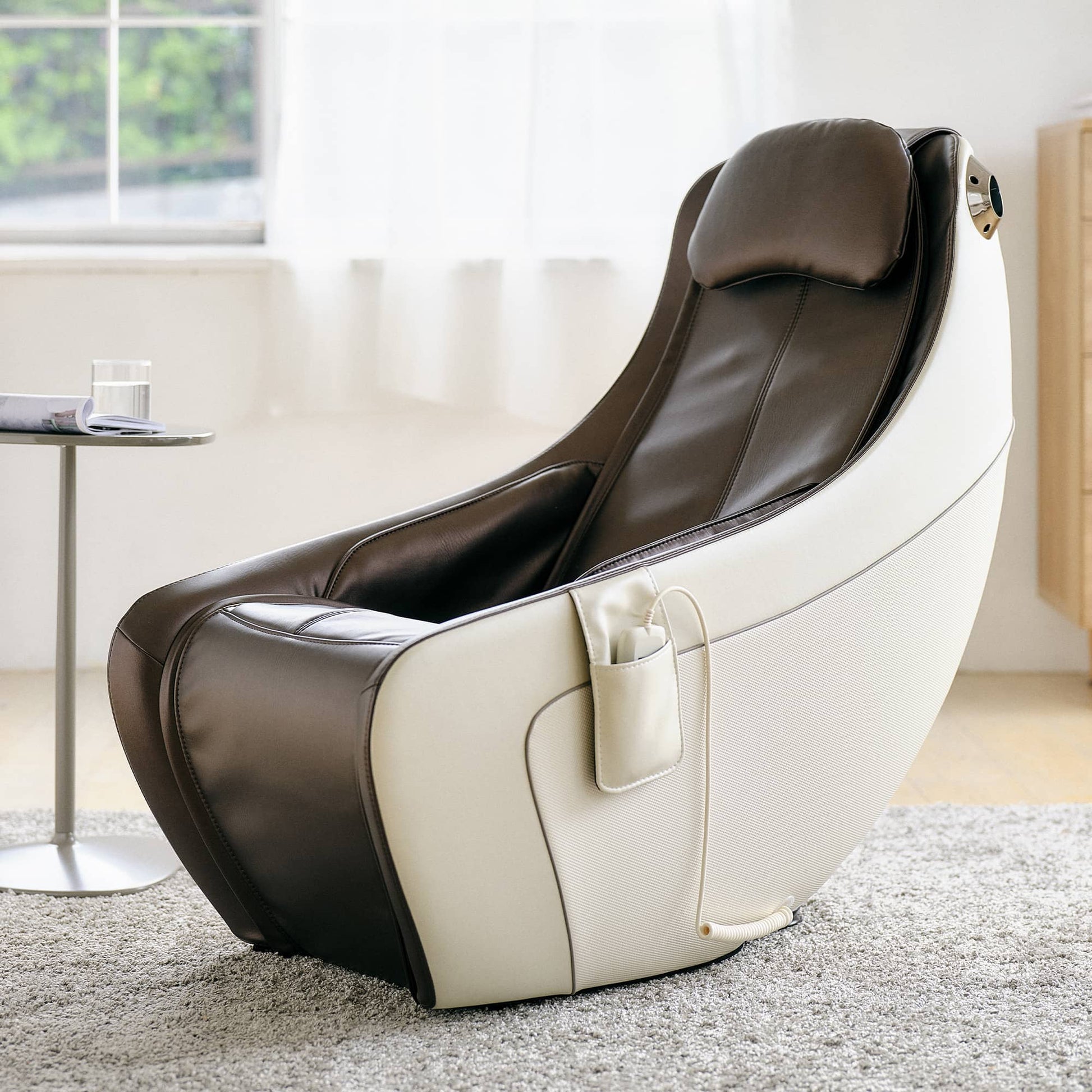 Synca Wellness CirC Massage Chair in brown and white, designed for ultimate relaxation and comfort
