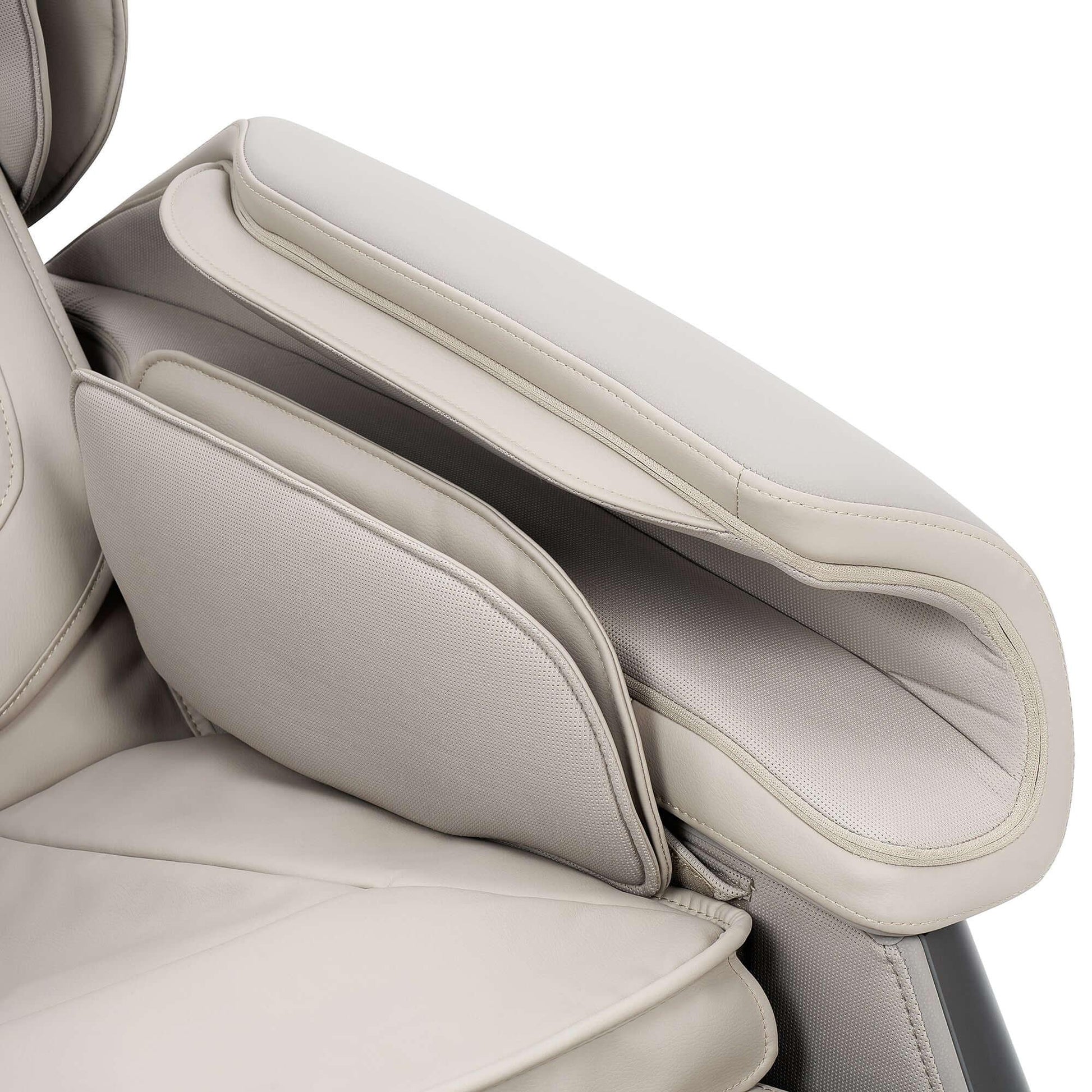 Close-up of Fujiiryoki Calm Plus electric massaging chair armrest and cushioning in light beige