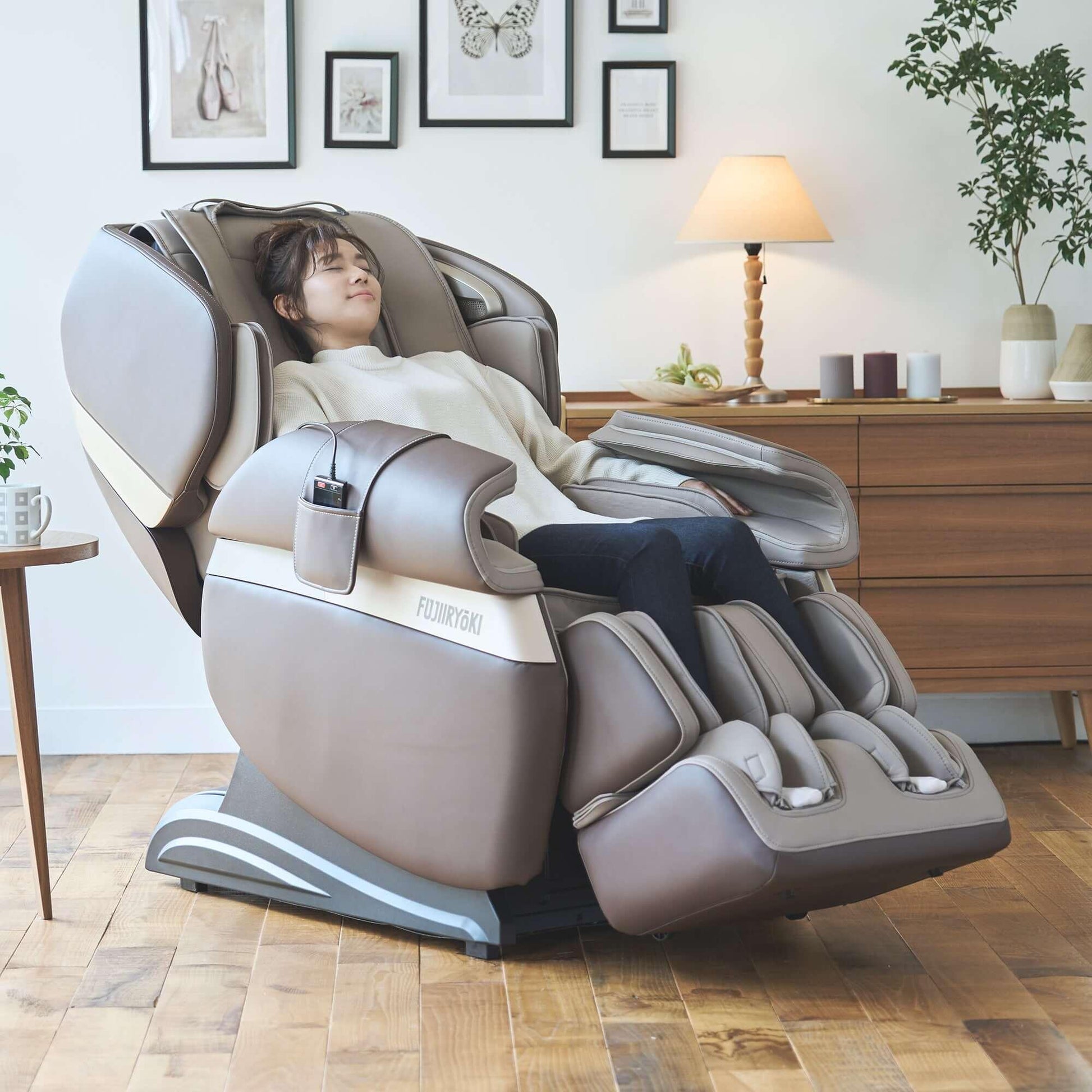 Fujiiryoki Calm Plus electric massaging chair in brown with full body recline and footrest
