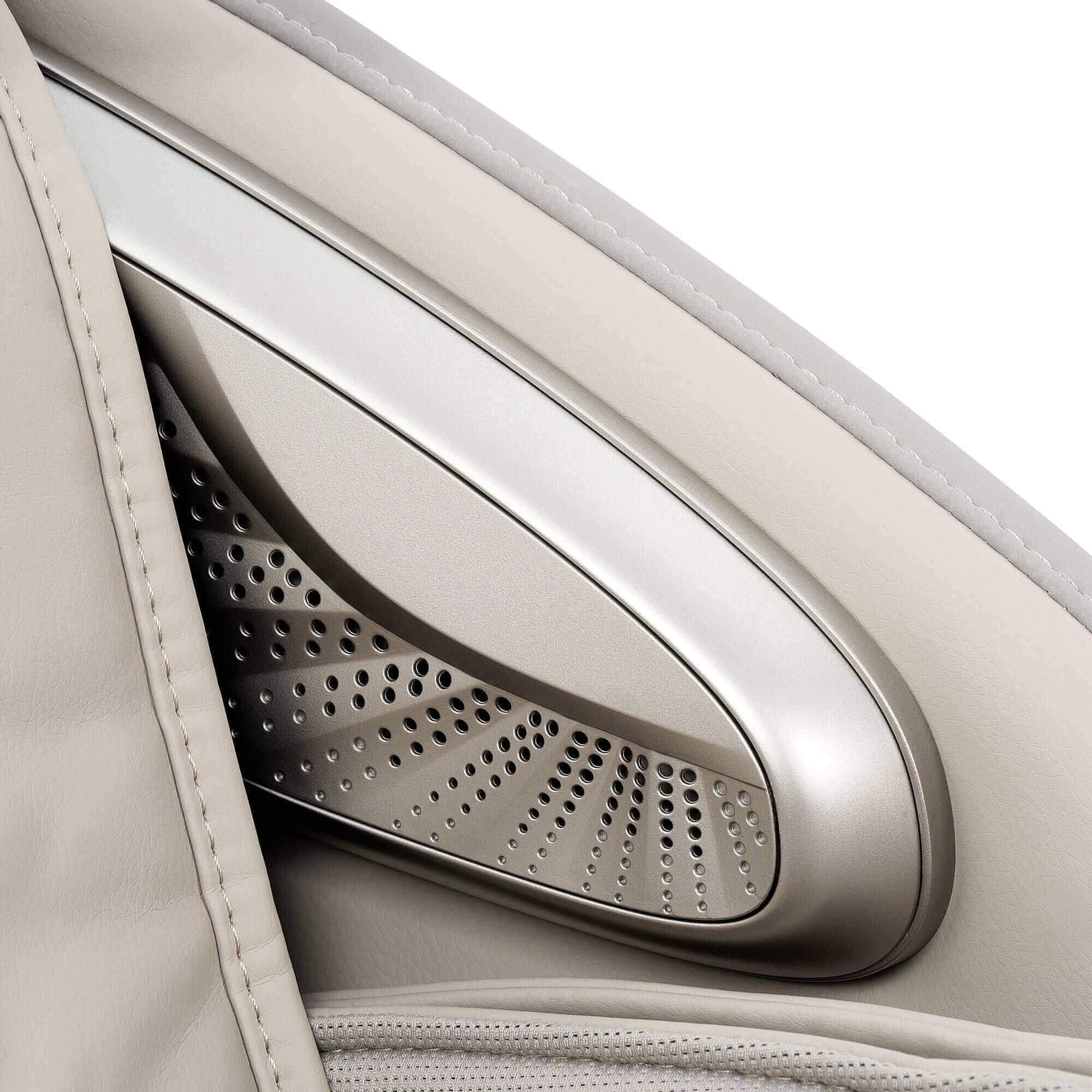 Calm Plus Massage Chair beige leather side panel with stitched armrest and perforated metallic speaker detail
