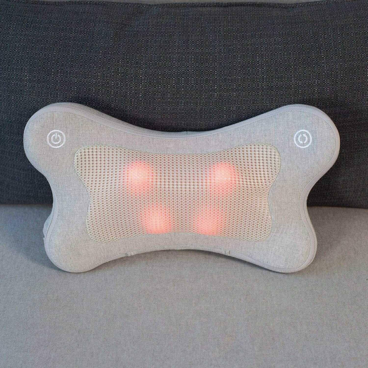 iPuffy - Premium 3D Heated Lumbar Massager in light grey fabric with a mesh centre and glowing red massage nodes
