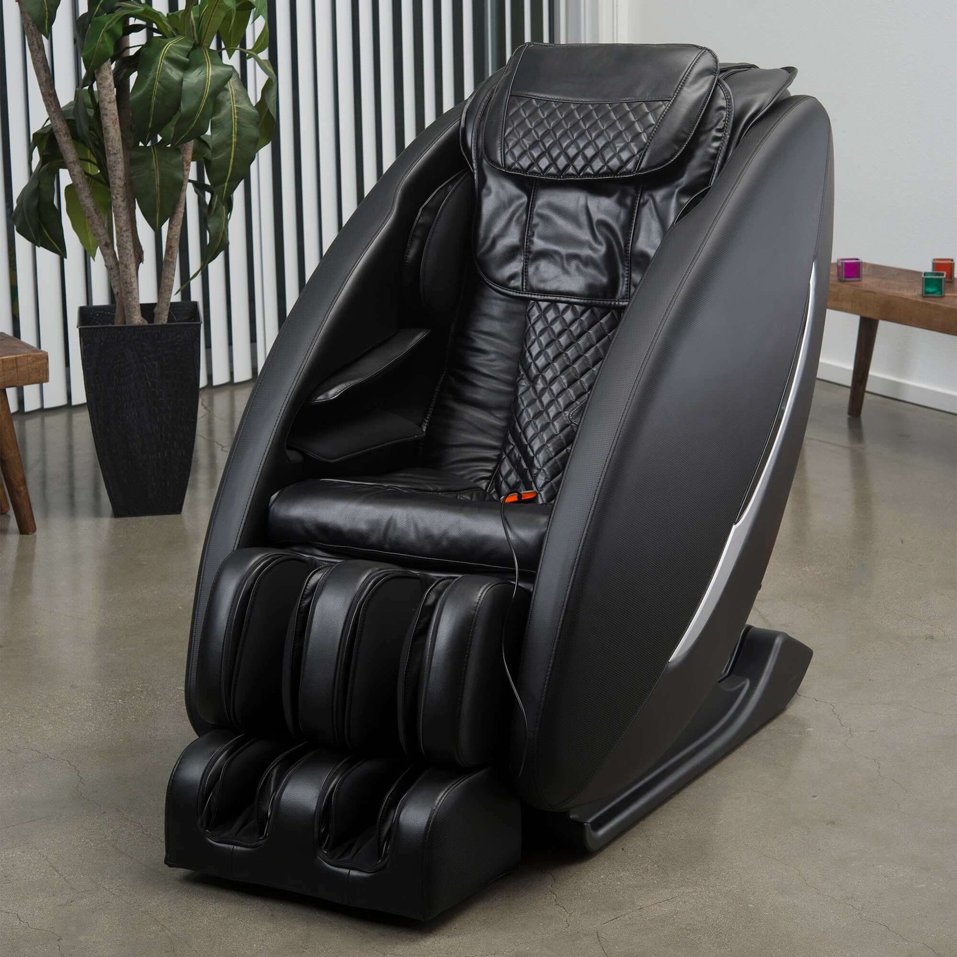 Inner Balance Ji Massage Chair electric massaging chair in black with padded seating and leg massage sections