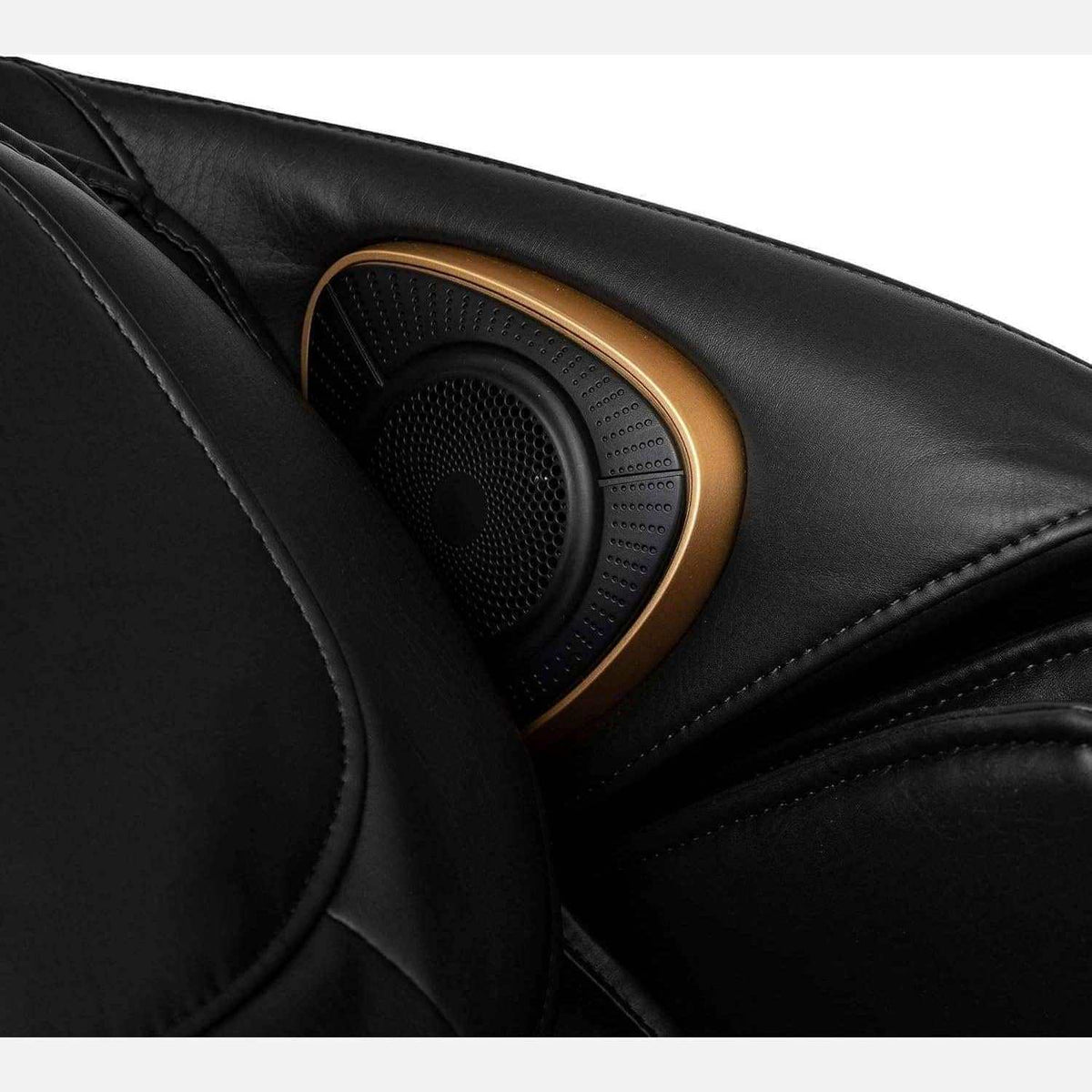 Jin 2 Massage Chair detail in black synthetic leather, with a textured circular speaker framed by bronze trim