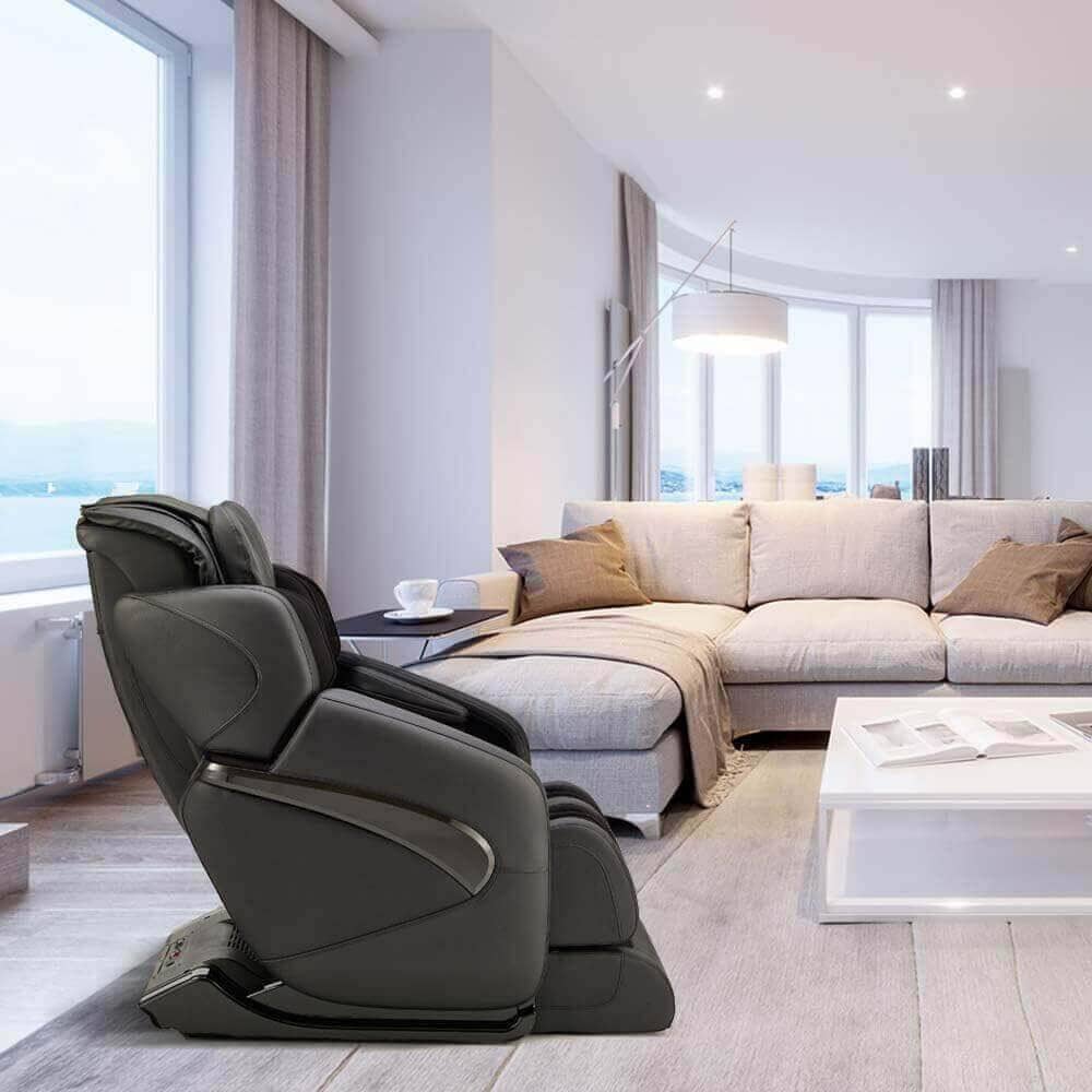 Fujiiryoki Jin massage chair in a modern living room with large windows and stylish furniture