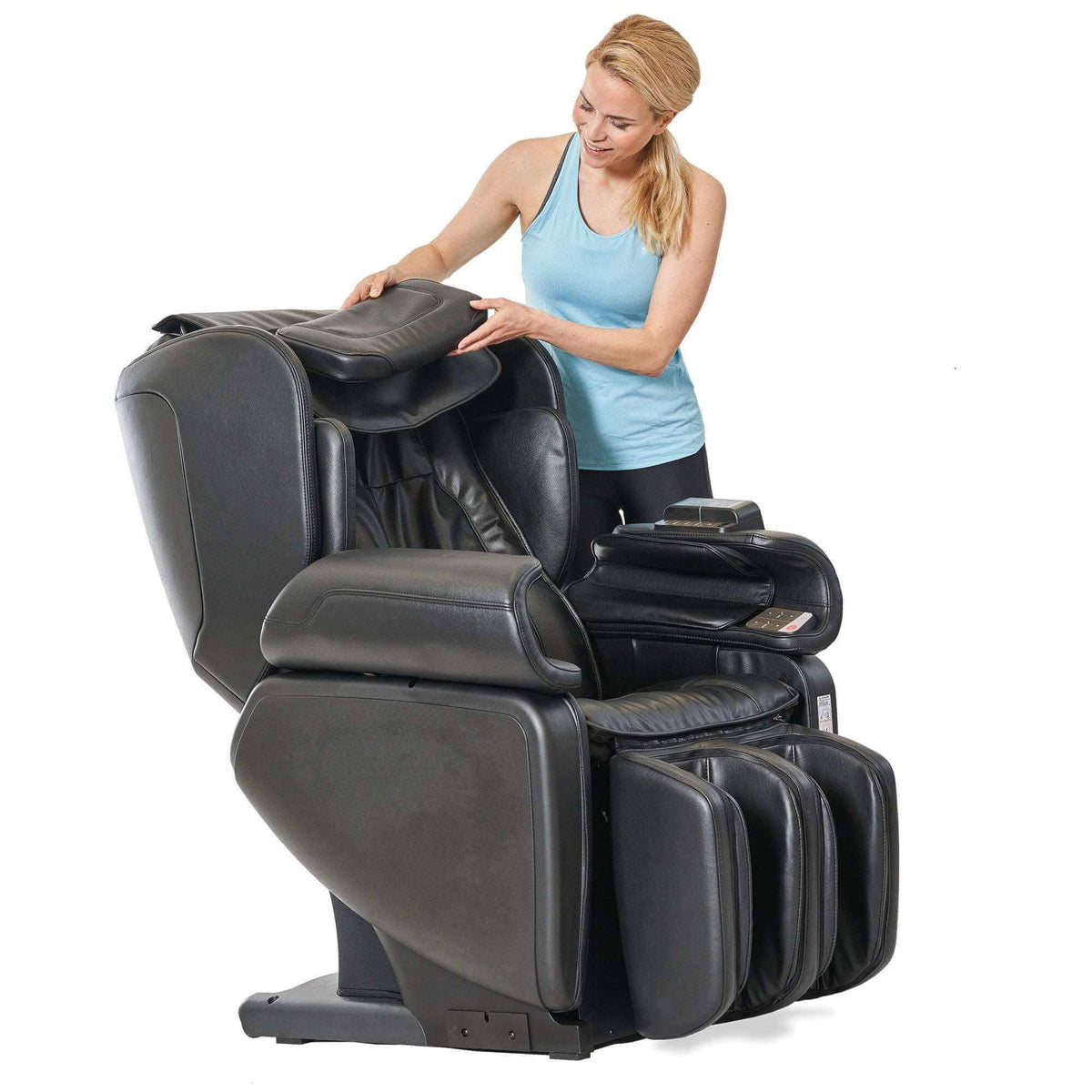 Kurodo E commercial massage chair in black with plush padded synthetic upholstery, arm compartments and calf rollers