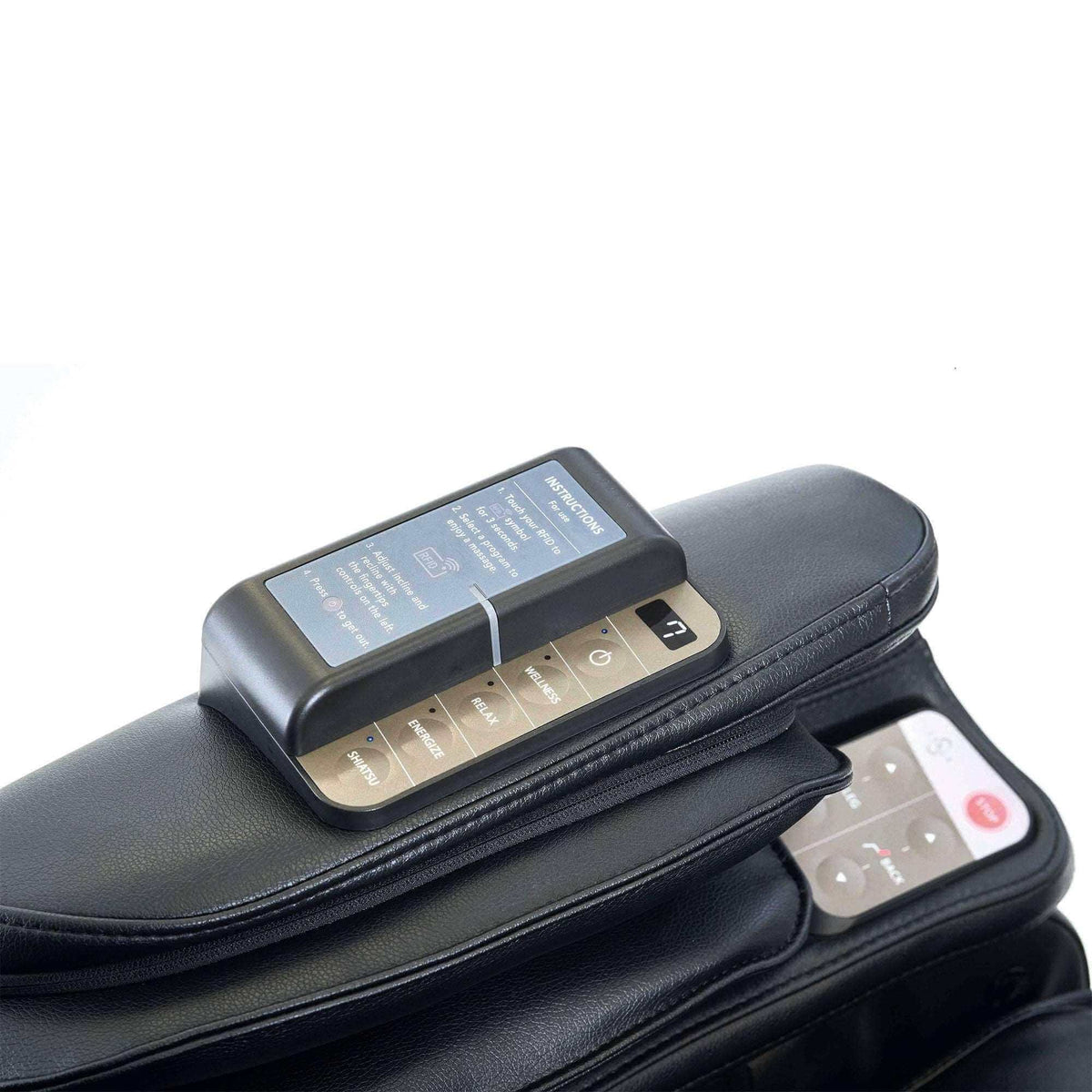 Kurodo E commercial massage chair with black leather upholstery and an integrated touchpad control panel